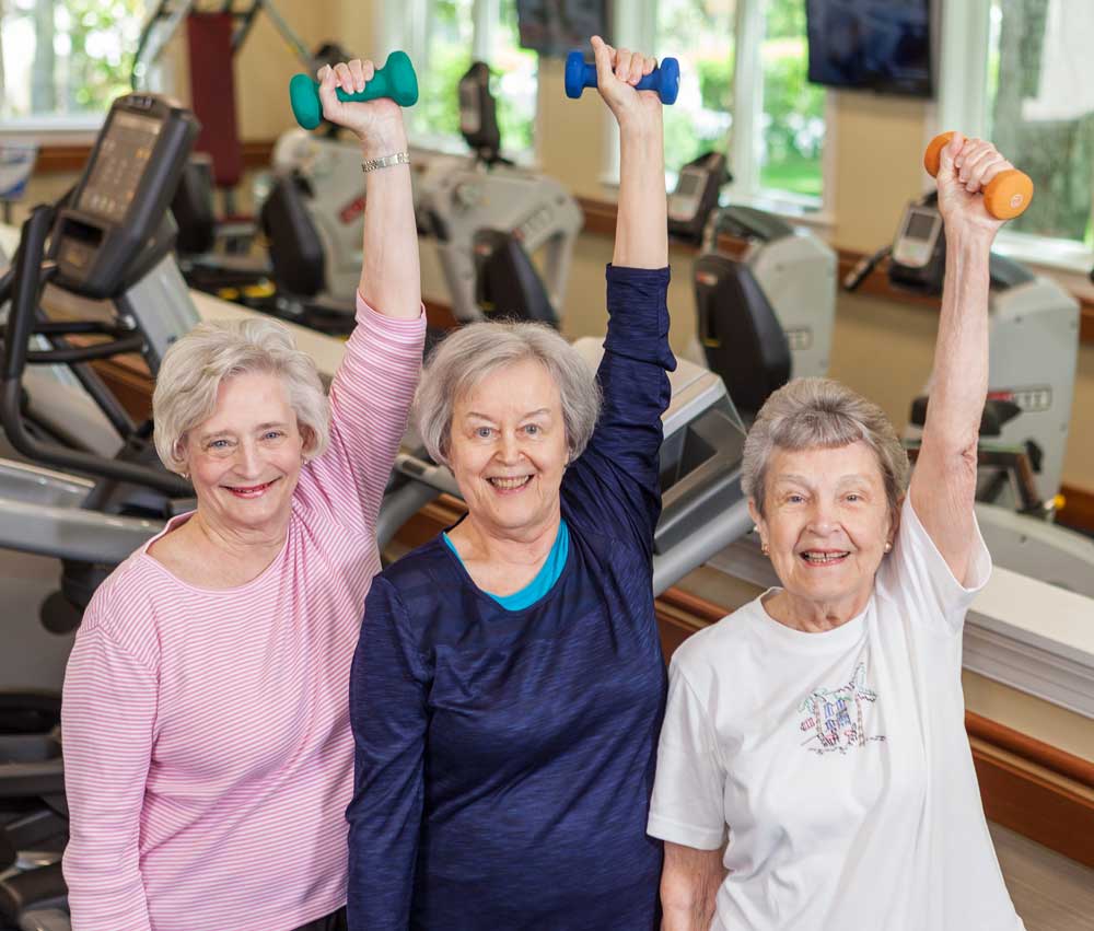 women lifting weights