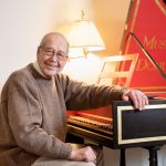 man at piano