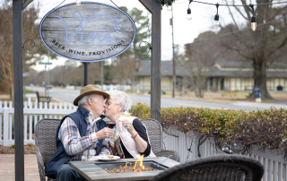 Senior couple sharing a kiss on a date