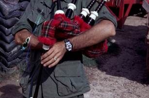 Soldier playing bagpipes