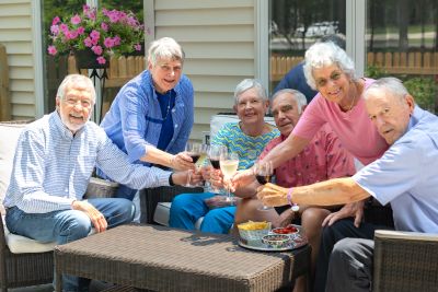 group of seniors sharing a toast