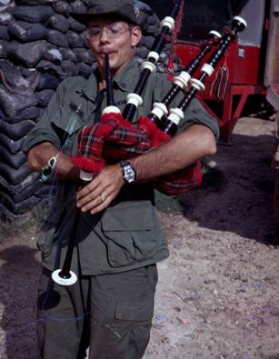 Soldier playing bagpipes