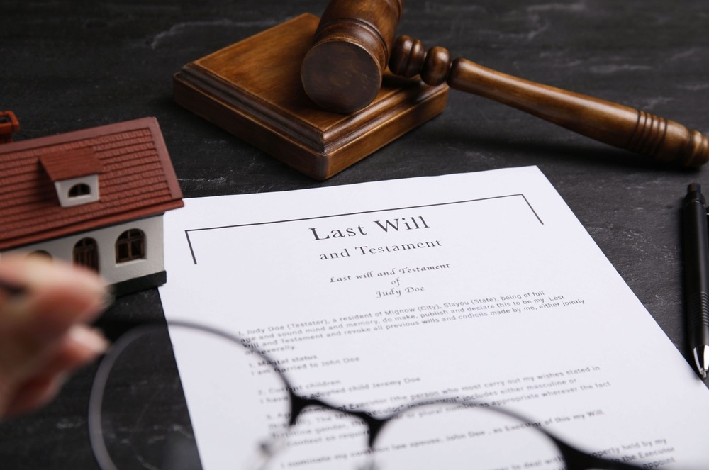 glasses and a will on a table