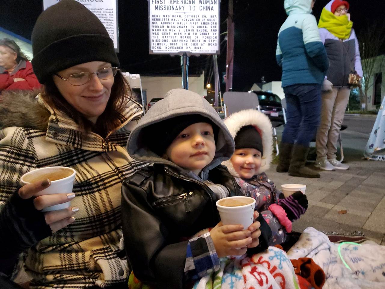Mom and kids drinking hot coco