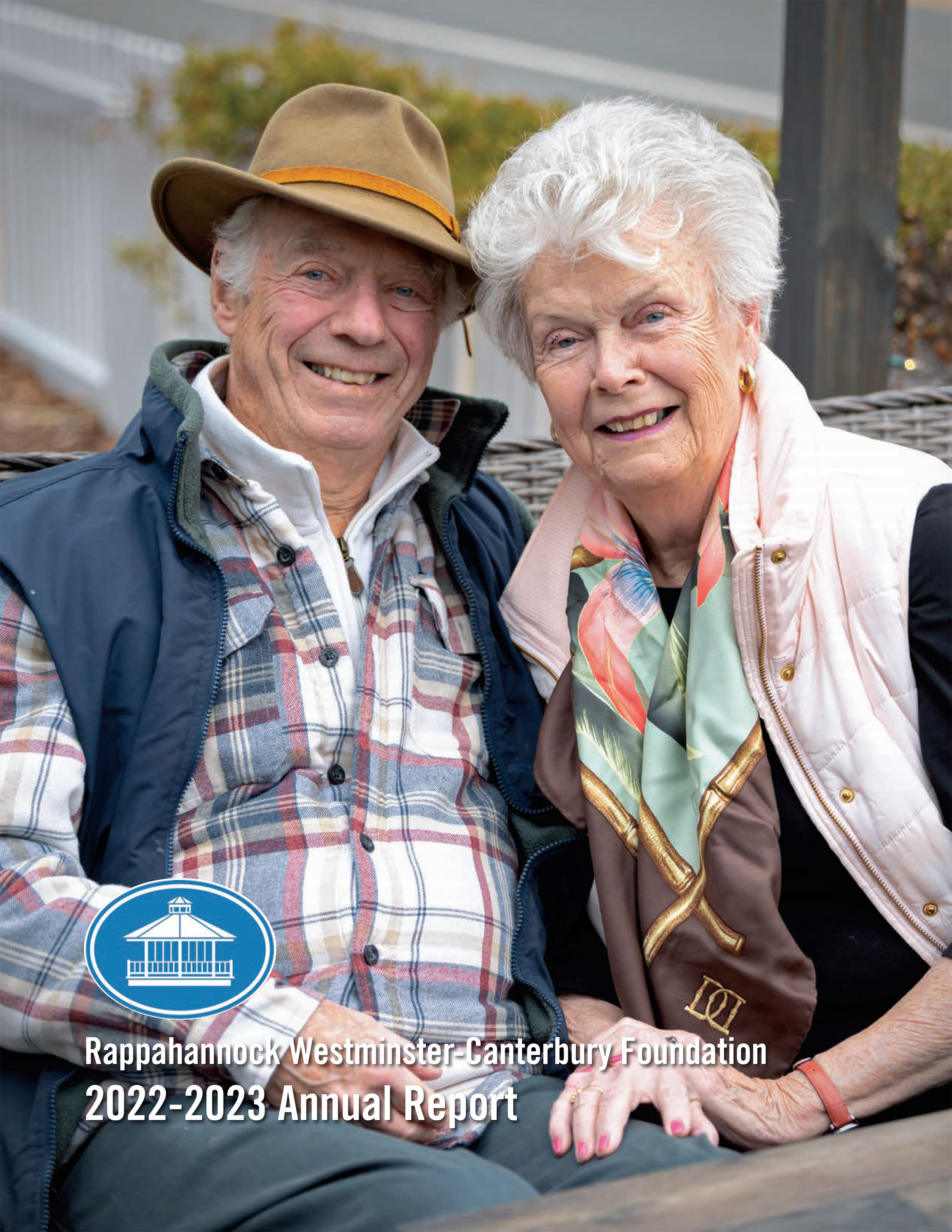 Smiling senior couple sitting outdoors together