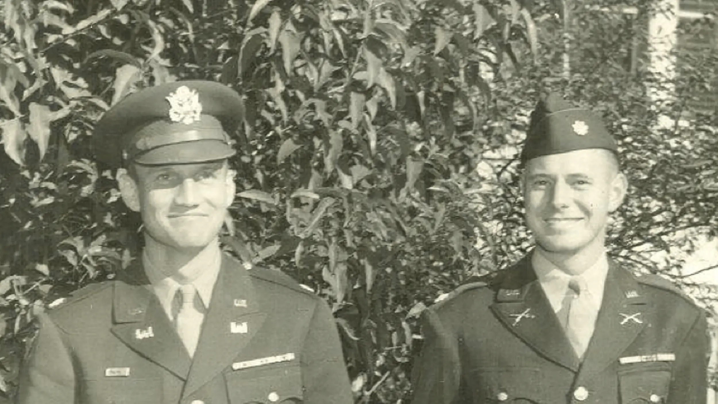 Two U.S. soldiers in uniform outdoors